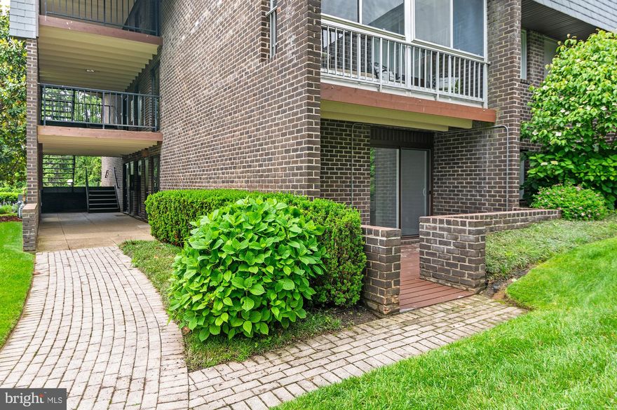 Discover the perfect blend of comfort and modern living in this stunning 1-bedroom plus den that can be used as a second bedroom/office/playroom, and 1 gorgeous full bathroom condo, located in the desirable Stevenson Village. One of only a few "walk right in units," this beautifully renovated condo, underwent a complete major renovation just months ago. This unit promises a fresh and contemporary lifestyle. Step inside to find an open floor plan that seamlessly connects the living and dining areas, enhanced by luxurious vinyl plank flooring, beautiful barn doors, and recessed lighting. The gourmet kitchen is a chef's dream, featuring magnificent stone countertops, Shaker cabinets, stainless steel appliances, and lots of storage space. The spacious main bedroom boasts a huge fitted walk-in closet, providing ample storage for all your needs. Enjoy the convenience of the main-floor laundry with front-loading washer and dryer, making laundry day a breeze. The bathroom features fabulous tile work, the latest in a lighted/fog free mirror, and a stylish stall shower, perfect for unwinding after a long day. Step outside onto your new patio with a view of gorgeous hydrangeas and greenery.  The community offers a wealth of amenities, including a sparkling outdoor pool, secure storage, and beautifully maintained common grounds. With a security gate and well-lit parking, you can feel at ease in your new home. The association fee covers a comprehensive range of services, from heat and hot water to lawn maintenance & snow removal, ensuring a hassle-free lifestyle. With easy access to sidewalks and street lights, you can enjoy evening strolls in this welcoming neighborhood. This condo is not just a home; it's a lifestyle waiting for you to embrace. Don't miss your chance to make it yours!