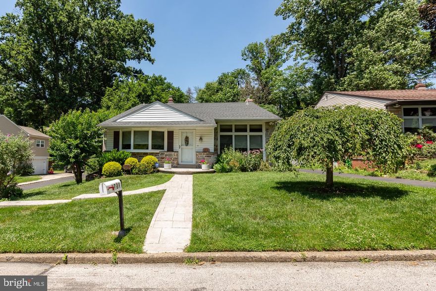 You will love this charming split level on a quiet street in the highly sought-after Wynnewood
section of Haverford Township. Enter into the bright foyer and relish this great open floor plan.
You will immediately notice the spectacular kitchen featuring beautiful Brookhaven
cabinetry with many custom features including large pantry, beveled glass doors, file
cabinet and much more. Other features of kitchen include Granite countertops and stainless
appliances. The centerpiece of the kitchen, the island, is a great gathering area and features a
beverage/wine cooler and microwave. The living room has large custom windows and the
dining room is conveniently located just steps from the kitchen. Upstairs there is the master
bedroom with his and hers closets and a ceramic tile bath. Two additional bedrooms with good
closet space and a ceramic tile full bath in the hallway. The walk up floored attic offers 2 levels
of additional storage. The lower level of the house has a utility and laundry room, an updated
powder room, a family room with a brick gas fireplace and a walk out to a beautiful patio. The
large landscaped backyard is fenced in and offers plenty of beauty and privacy. A great spot for
entertaining. One car garage. Private parking in driveway and additional street parking if
needed. Original Hardwood floors. Newer roof, kitchen, windows, heating systems and electric,
as well as other upgrades wonderfully maintained. This home sits just a few houses from
Powder Mill Park, a short walk to Wynnewood Valley Park and resides in the Award-Winning
Haverford Township School District. Conveniently located in the Wynnewood section of
Havertown and is within walking distance of Penn Wynne library and the Rt. 100 line; Close to
public transportation, Rt. 476, R5 train, Lankenau Hospital and Suburban Square. Twenty
minutes to center city and the airport. Don’t miss out on this one. Haverford Township-a great
place to live!