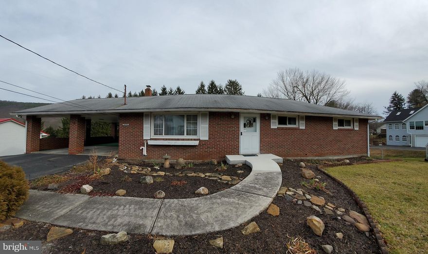 Nice 3 bedroom, 2 bath brick  home situated on  .52 acre!  Tucked back off the main road, but close to all the restaurants and shopping.   One car garage, plus 2 car carport that can convert to patio in the summer. Seller has pulled back a corner of the carpet in the living room to show Buyer the wood floors.  Main source of water is public, but well is still connected to was cars or water flowers. Lower level family room.  Call today for you showing!!