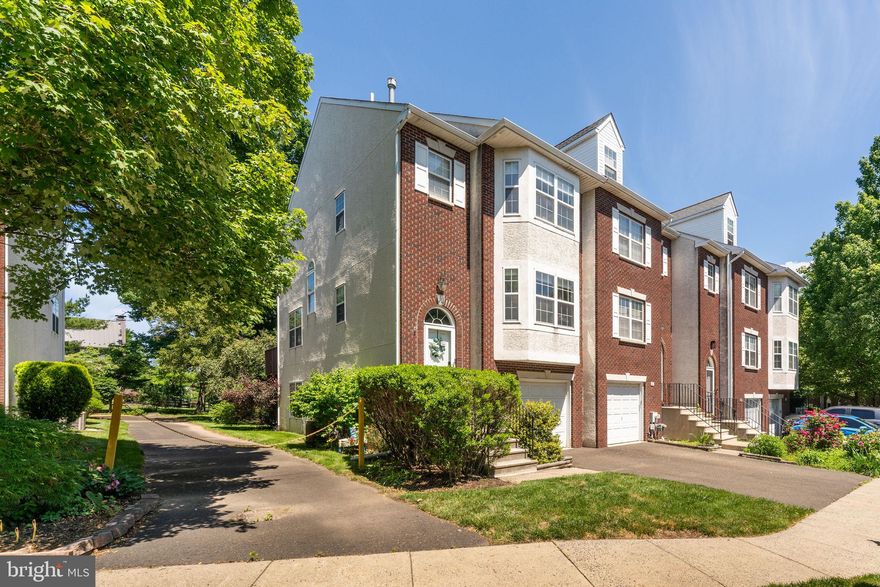 Fantastic end-unit townhouse with a finished walkout basement in the beautiful community of Pine Tree Ridge in Montgomery Township. The stylish entry foyer offers good privacy from the rest of the home. The main level offers a large eat-in kitchen with a bay window, quartz countertops, tile backsplash, abundant cabinetry, and stainless steel appliances. The spacious living room is open to the adjacent dining room with luxury vinyl plank flooring throughout. The living room also has sliding glass doors to an expansive raised deck. A powder room completes the main level. A turned staircase takes you to the upper level. The main bedroom has a vaulted ceiling, bay window, ensuite full bath and walk-in closet. Two other good sized bedrooms are serviced by a full hall bath. The lower level is beautifully finished and has glass doors leading to a patio area plus the laundry and a storage area. Great natural light throughout, plus warm neutral decor. 1-car garage. Backs to trees and walking paths.  Terrific location with easy access to all the shops, businesses and restaurants in Montgomeryville.  Brand new central AC system (condenser and evaporator coil), July 2024.