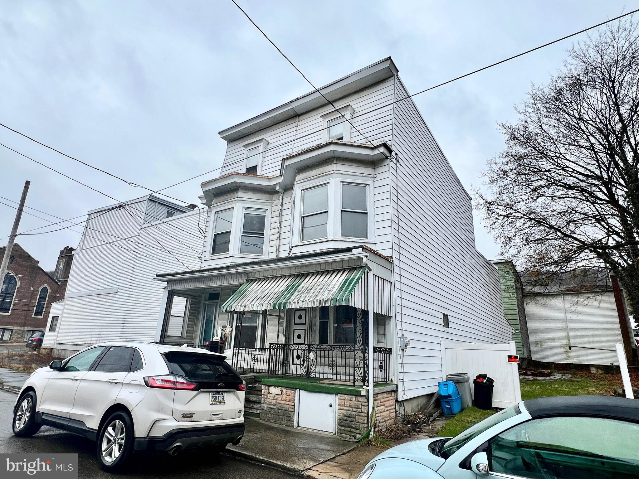 Roll up your sleeves and make these two homes into great investment properties! This sale includes 2-half doubles and a vacant lot - 14-16-18 W. Mahanoy Ave., Mahanoy City. The information provided is for 14 only. 16 side includes a double living room, breakfast room, kitchen on first floor, 3 bedrooms and a full bath on second floor and two more bedrooms on third floor. There are radiators in 14. In 16, there is an oil furnace in basement, but all radiators were removed. Both of these homes are on the same tax ID and deed. The attached vacant lot is a separate parcel.