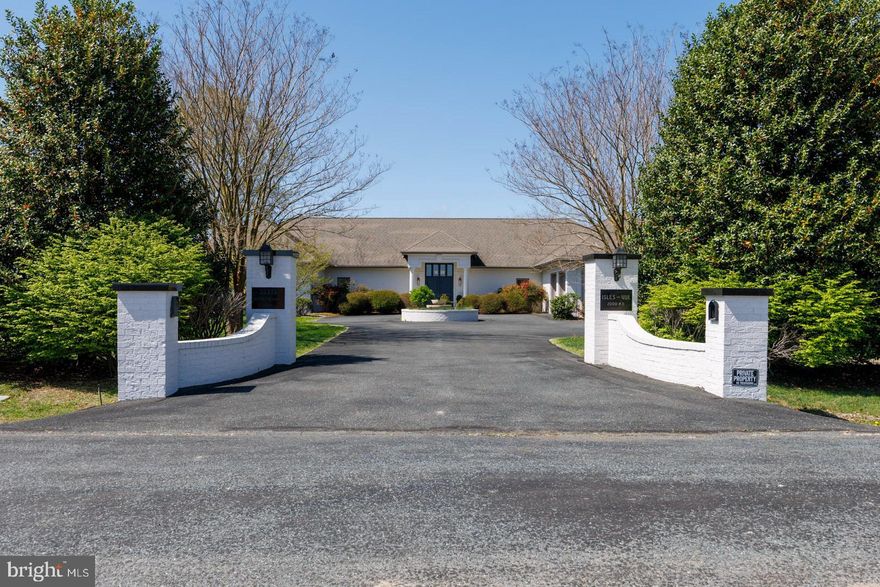 Custom Contemporary on Wye River with Captivating Sunset Views. This solid one-story 3,700+/- sq ft brick rancher has been tastefully updated. Home sits on 5+/- acres and features high ceilings, Brazilian Cherry flooring, open floor plan with large kitchen with island, vaulted ceilings in the family room with fireplace, separate dining, sunroom, office/den/extra bedroom space, waterside primary suite with gas fireplace, huge walk-in closet, bath with jacuzzi tub, tiled/glassed shower, two additional generous-sized en-suites. Butler's pantry, massive (25’ x 44’) heated garage with custom cabinetry, painted floor, and a generator. Exterior features include, paved driveway, heated gunite pool with full bath cabana, concrete sun decking, detached (24’ x 24’) custom workshop with separate paved driveway, horseshoe and bocce courts, high elevation, manicured lawn and landscaping, 500’+/- of protected shoreline, 150’ pier with two slips, 4’-5’ MLW, and an incredible western view overlooking a deep water safe harbor in the Wye River, just off the Miles River.