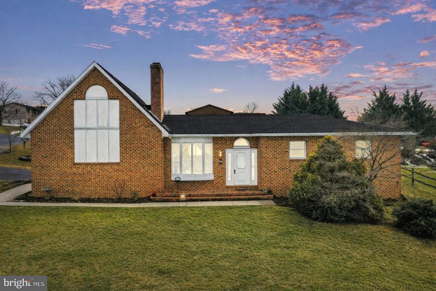 Welcome to 47 Emerald Drive, a beautifully crafted custom brick home offering over 3,000 square feet of flexible living space designed for those who appreciate character, versatility, and privacy in the highly sought-after Laurich Gem North neighborhood.
Situated on a rare double corner lot along a quiet, low-traffic street, this distinctive property delivers both presence and tranquility. Unlike standard floor plans, this custom-built home offers architectural character and thoughtfully designed spaces that adapt to your lifestyle.
Inside, abundant natural light pours through oversized windows, highlighting the warmth and craftsmanship throughout. A striking double-sided wood-burning fireplace creates ambiance between living spaces, perfect for cozy evenings and effortless entertaining. The updated kitchen blends style and functionality, while the dining area offers a direct view of the Appalachian Mountains — providing a stunning backdrop for everyday meals and special gatherings.
A spacious loft overlooking the main living area and pool offers a versatile retreat ideal for a home office, studio, reading lounge, or potential fifth bedroom conversion — a rare feature that enhances both flexibility and value.
The primary suite serves as a private sanctuary featuring a boutique-style custom walk-in closet with extensive built-in storage and display shelving, designed for exceptional organization and wardrobe capacity. The suite flows into a luxurious Italian travertine primary bathroom complete with natural stone finishes — the perfect place to unwind and relax after a long day.
The finished lower level further expands the home’s versatility with expansive bonus space perfect for guests, hobbies, private offices, or multigenerational living. Two additional rooms with closets provide flexibility for a variety of needs. A dedicated theater room and a generous reading/library area enhanced by built-in bookshelves create an ideal environment for entertainment, work, and relaxation.
Step outside to your fenced backyard oasis featuring an in-ground pool, mature peach trees, and exceptional privacy — perfect for summer gatherings and peaceful outdoor enjoyment. (Pool liner replacement may be considered with acceptable offer.)
Additional highlights include smart home features, ample parking, and two STIHL robotic lawn mowers that convey with the property for effortless lawn care.
This is a rare opportunity to own a distinctive custom home offering space, scenic views, privacy, and refined living in one of Chambersburg’s most desirable neighborhoods.
Please remove shoes or put on shoe coverings provided upon entering the home.