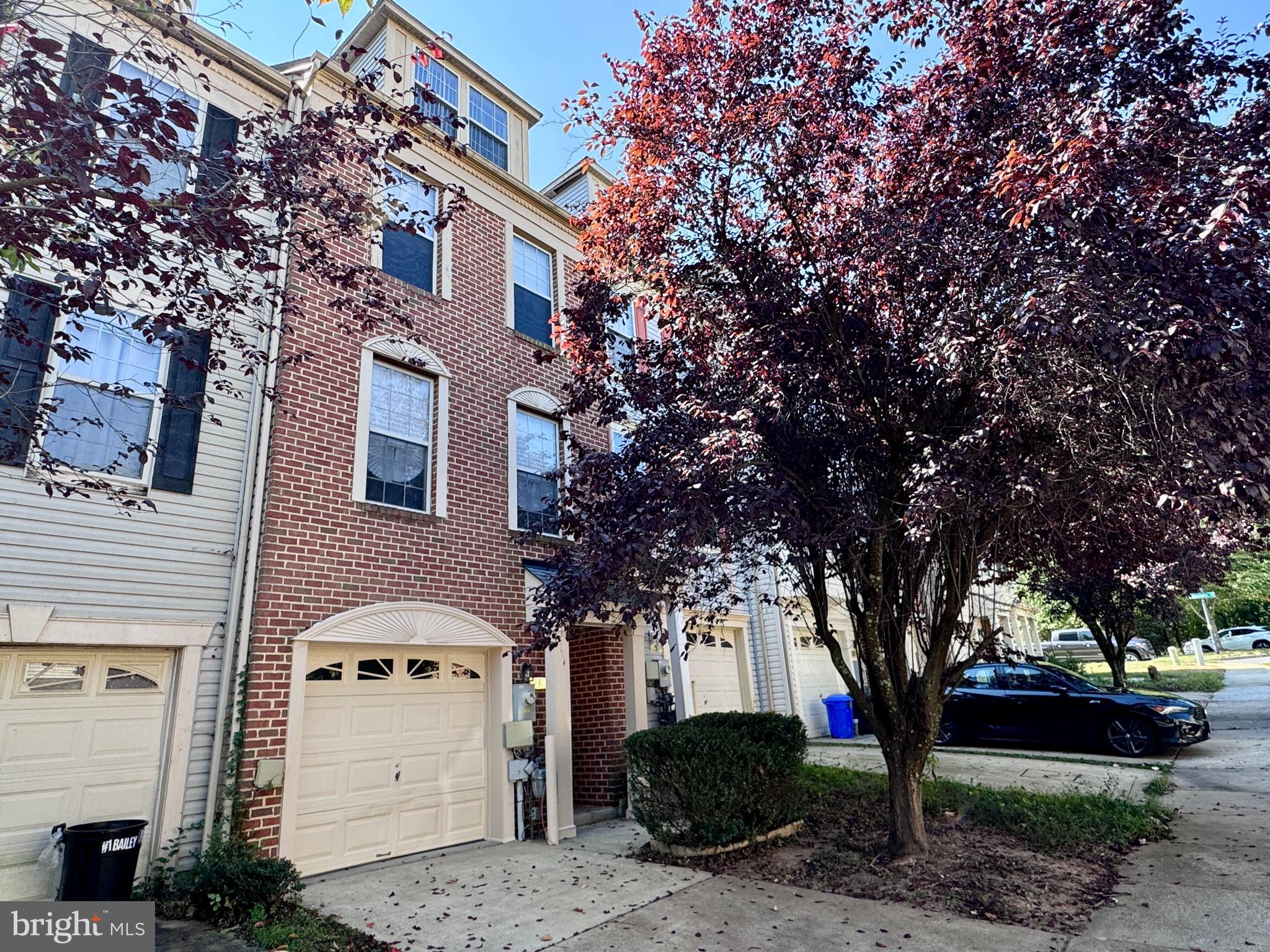 Gorgeous 4-Level Townhome ( in New Town at Owings Mills) – 3 bedrooms, 2.5 baths & 1-car garage! Freshly painted throughout with new carpet & new kitchen flooring. First-floor family room features a cozy gas fireplace, while the bright eat-in kitchen offers a skylight, 2018 stainless appliances (all stay!) & access to a rear deck- perfect for entertaining. The entire 4th floor is a private owner’s suite with vaulted ceilings, sitting area, generous closets & a bath with soaking tub & separate shower. New 2018 roof with warranty. Close to shopping and restaurants in Foundry Row, Metro Centre, Mill Station and more!