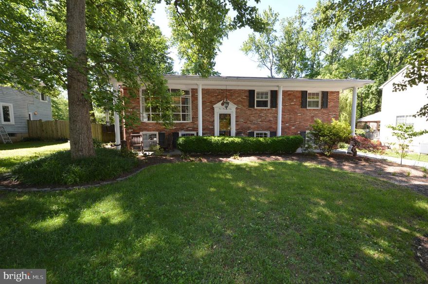 Large 4 Bedroom 4 Full Bathroom home in the Hillsmere Community with over 2,700 finished square feet.  Includes a private connected fully functional one bedroom in-law suite/apartment with separate first floor entrance, full size kitchen, living room, dining area, washer/dryer, and fireplace. The connected apartment works perfect for earning extra rental income or providing a private home for extended family.  

The main home has a large open kitchen and family room perfect for entertaining.  All three bedrooms in the main home have full ensuite bathrooms. Fantastic screened-in rear deck with steps to a fully fenced backyard with beautiful landscaping.  Includes granite kitchen counters, stainless steel appliances, main floor fireplace, large backyard shed, off street parking for four cars, Bose speakers preinstalled in the main level family room, and plenty of storage space.

The home sits on a quiet street walking distance to the Hillsmere Community community beach, boat ramp, playground, swimming pool and Key School.  Short 15 minute drive to the Naval Academy and downtown Annapolis, 30 minute drive to Washington DC and Baltimore.