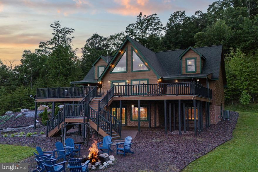 Premier Revenue-Producing Lodge in the Blue Ridge Mountains – Proven Success, Turnkey Investment

Here’s your chance to own a top-performing short-term rental in one of Virginia’s most desirable mountain destinations. Located near historic Luray, this five-bedroom, three-bath lodge offers expansive living space, stunning Blue Ridge Mountain views, and easy access to the Shenandoah River, Luray Caverns, and Shenandoah National Park. In operation since November 2007, this established property consistently generates six-figure annual revenue and maintains a strong guest following. Currently active on AirBnB with a stellar rating. For reviews and booking details, search: “Mountain Views, Hot Tub, Pet Friendly!”

Recent Upgrades & Features Include: 
-Massive wraparound deck space for entertaining
-Soaring ceilings and a floor-to-ceiling stone fireplace in the great room
-Updated kitchen countertops and modern appliances
-Cozy furniture and décor to enhance guest comfort
-Fresh exterior staining and sealing 
-Professional landscaping and ongoing maintenance for peak condition

This property is fully turnkey and comes with a professional property management team already in place, making it easy for a new owner to step in with confidence. Additionally, the lodge has numerous upcoming bookings on the calendar, offering immediate income potential from day one.

Guests love the pet-friendly amenities, hot tub, and mountain views, plus the ease of access with no steep roads—just minutes from downtown Luray.