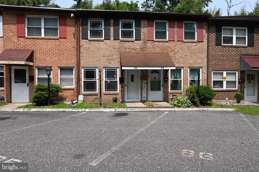 Welcome to this delightful two-story townhome, now available in the peaceful and private community of The Village of Green Tree. Tucked away in a serene setting, this neighborhood offers assigned parking, scenic walking trails, and a low monthly HOA fee—providing both comfort and convenience.
Step inside to a warm and inviting living room. Galley-style kitchen and bright eat-in dining area. Large windows fill the space with natural light, while sliding glass doors open to a secluded backyard patio—perfect for enjoying your morning coffee. Also on the first floor is a powder room.
Upstairs, you’ll find two generously sized bedrooms and a full bathroom, complete with an in-unit washer and dryer for added ease. A fully floored attic offers excellent storage or the exciting potential to be finished into a third floor living space, office, or guest room.