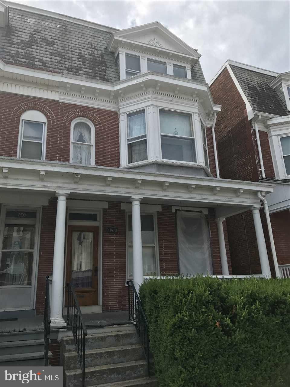 Opportunity is waiting for you here! This large 5 bedroom brick home in York City is a great income property or starter home. Overall in good condition but in need of some minor work to make it really shine, it is PRICED TO MOVE!! Large rooms, tons of space! Detached garage. Check this one out ASAP because it won't be on the market long. Tons of house for the money.