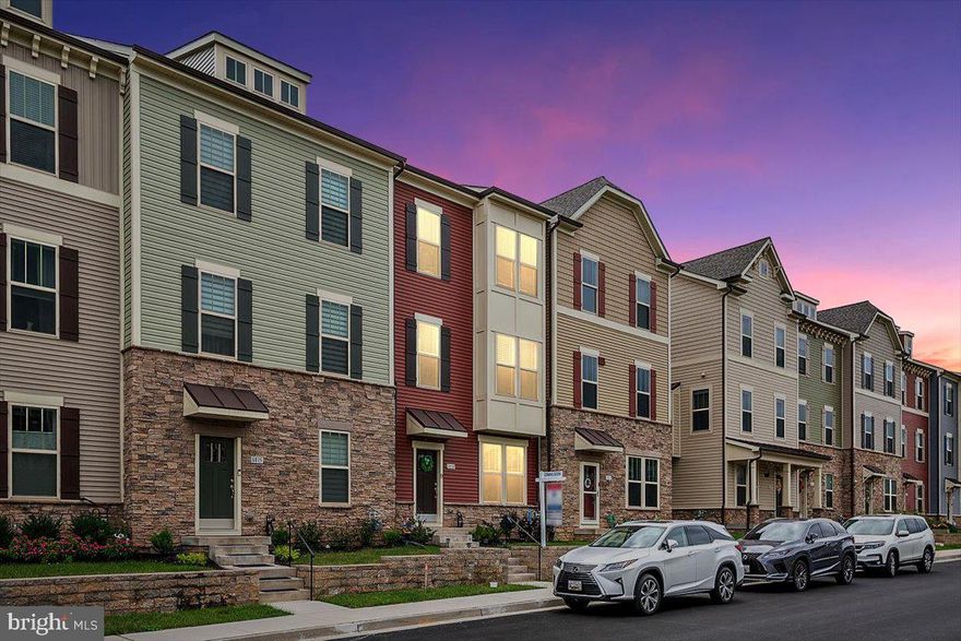 Welcome to 8813 Shady Pines Drive in Frederick, Maryland. This 3 Bedroom 2.5 Bathroom 2500 SQFT Townhome in the Villages of Urbana has all the bells and whistles of a Model Home but no need to wait! Layout of the Quincy Model but includes the 4FT Extension, Oversized 2 Car Garage and Gorgeous Interior Upgrades. Boasting Upgraded Floors throughout the Lower Level and Main Level, Detailed Trim Package, Gourmet Kitchen with Quartz Countertops, Oversized Island, Soft Close Cabinets, Recessed Lighting and Gas Range. Perfect for entertaining! Lower Level has Rear Entry Oversized Garage with Finished Lower Level Family Room and Front Door Access to Stoned Retaining Wall and Concrete Community Sidewalks. Main Level greets you with the Gourmet Kitchen, Living Room, Formal Dining Space and Large Walk Out Composite Deck.  Then travel upstairs to Huge Owners Suite complete with Walk In Closet and Bonus Soaking Tub in attached Bathroom.  2 Additional Carpeted Bedrooms and Full Bathroom on Top Floor. Plus, Laundry on the Upper Level as a huge convenience! Community includes Tennis Courts, Outdoor Pools, Garden, Walking Trails, Playgrounds and a Clubhouse. OR travel any local Shop, Restaurant, Grocery or Entertainment that Beautiful Urbana has to offer!!!