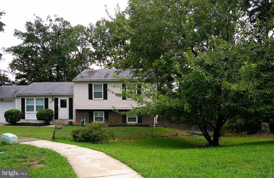 Don't pay attention to DOM, property was temp. off market.  Brand NEW ROOF WOW!  Welcome to this 3-level split, cul-de-sac location lovingly cared for single family home close to the national harbor and major commuter routes all under 500K.  This home features, brand new roof, hard wood flooring, stainless steel appliances, granite counter tops, walk out full basement with new carpeting, owner's bedroom with private bath, deck leading to an expansive back yard backing to mature trees, and so much more...  Enjoy spring and summer BBQs in your expansive backyard private for entertaining. Close to quality shopping, major commuter routes, and entertainment!  Welcome and Enjoy!