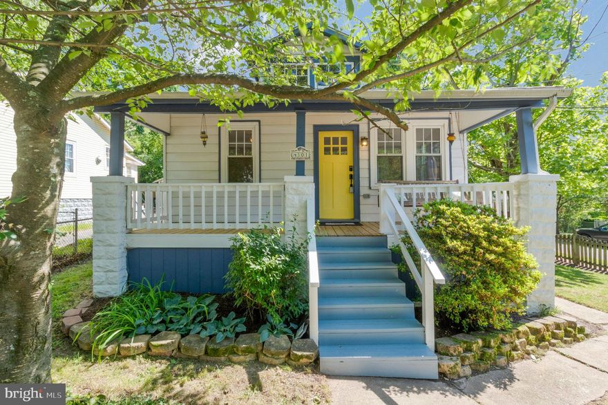 Set your sights on this sweet 2 BR, 1 BA corner bungalow with large unfinished walk-out lower level, surrounded by beautiful architecture in the historic district and just steps to the Gateway Arts District! Take a breath on the front porch swing, then open the sunny yellow front door to enter this tidy nest: LR flows to DR and Kitchen with custom shelves and farm sink. The 2 sizable bedrooms plus a tiled bathroom with bathtub/shower round out the main level. Walk out the rear kitchen door to a small deck leading to a large corner lot yard with 2 patios and PARKING! The open lower level houses a side-by-side washer and dryer (2020) and hot water/heat combination unit (2022.) An electric heavy up was done, plus central air was installed in 2021. 

Revel in the beautiful architecture of Historic Hyattsville, just steps to YES! Organic Market, Magruder Park, Arts District, shops, restaurants, bike, metro, and bus routes - all the things!
