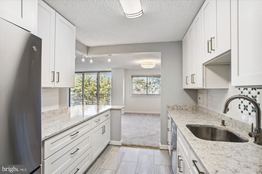 This extra large 3-Bedroom end unit was totally remodeled and renovated in 2022, and just repainted this month.  All utilities, except cable, condo fees, and outside parking are included with the rent.
All window coverings by Hunter Douglas and new carpeting  throughout the unit  except the primary bedroom, that features a refinished parquet wood floor.  Spectacular, renovated kitchen with GE Profile stainless steel appliances and the kitchen has been opened up to the LR/DR combo with an island for food prep or dining.  The kitchen features a 42-inch white cabinets with under counter lighting, a pull out spice drawer, a floor to ceiling pantry and "French" type refrigerator with interior water dispenser and bottom pull out freezer with ice maker. The gas stove is wifi compatible. 
Both bathrooms have been completely updated with beautiful tile floors and walls, new vanities and barn door entry to minimize loss of space. This rarely available type of unit offers space for office, den or bedroom use--you decide based on your needs. As you come in the unit, there is a storage closet that is 5 x 11 feet for additional storage for clothes and items--something not typically available in condos!
Also, if you like getting in your steps, you can by-pass the elevator and walk down one flight of stairs adjacent to the unit and have direct access to the main lobby or rear exit to outdoor parking. Many amenities (tennis, pool, front desk personnel, etc.) at the property.  
Easy access to the Pentagon via Express Lanes,  DASH and Metro buses that use the Express lane to the Pentagon. Nearby shopping and dining in Shirlington via the pedestrian bridge. If you bike to work or just for pleasure, the bike path  goes to National Airport with access to DC, Alexandria, National Landing, Crystal City, and Pentagon City, or Leesburg.
Parc East has a front desk 24/7 for visitor access, package delivery, and an extra layer of security.
NOTE: The laundry room is located on all floors. However, the building is installing new dryer vents on each floor. The washers are operational, but dryers are not presently available.  The  Owner can't promise when laundry rooms will be available, however, a $50/month discount on rent until the laundry rooms are operational--which should be operational by September. Application instructions in Document Section at top of listing.