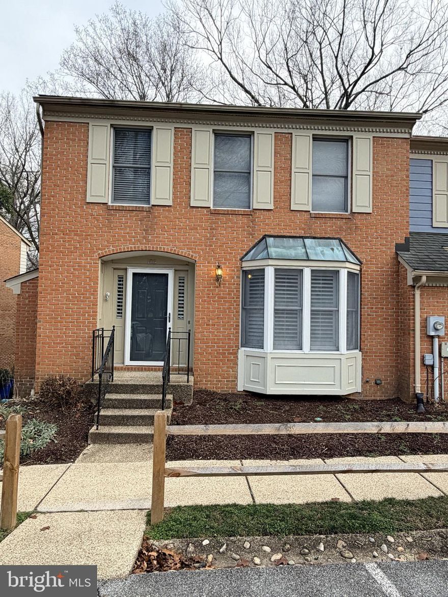 Motivated Sellers!!! 100 % financing available on this Very nice end unit home with 2 fireplaces, deck, patio and large rooms. Hardwood floors thoughout with exception of the 3 bedrooms.. There are two full baths upstairs and a half bath on the main level. The lower level has a bedroom, full bath, kitchen area and large  living room/ family room with bookcases, fireplace and  a walkout to a large patio.  There is a large laundry room on the main level with washer and dryer.The basement could be a great rental unit or inlaw apartment.  This is a very nice home with lots of financing options including 100% financing as well as Down Payment Assistance  Programs.