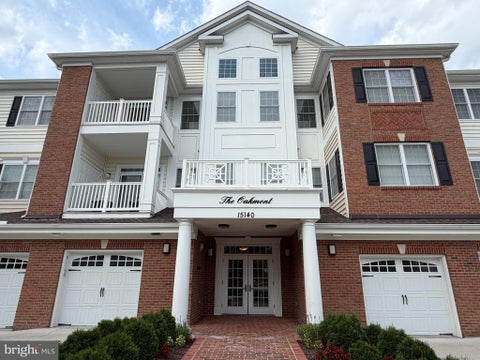 Photo of 15140 Heather Mill Lane #404, HAYMARKET, VA 20169 (MLS # VAPW2127970)