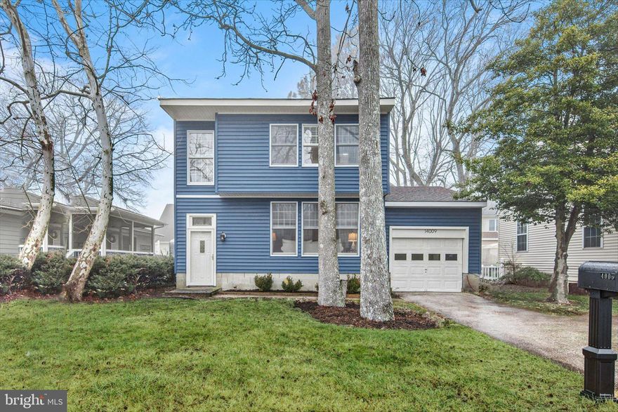 Welcome to your beach retreat in the highly desirable Caine Woods community in North Ocean City. Perfectly suited for year-round living, a relaxing vacation getaway, or a savvy investment opportunity, this updated contemporary beach cottage offers bright, easy coastal living just a few blocks from the ocean. As you enter the home, you are welcomed by a gorgeous two-story foyer that creates an immediate sense of openness. Filled with natural light, the home features a spacious living room with abundant windows and a striking architecturally significant spiral staircase that adds character and a modern aesthetic. The open feel continues into the sunny dining area, where sliding glass doors lead to a deck overlooking the fenced rear yard, an ideal space for outdoor dining, relaxing, or entertaining after a day at the beach. The bright white kitchen offers a clean, coastal feel with stainless steel appliances, quartz countertops, and a convenient breakfast bar for casual meals or morning coffee. Just off the kitchen you’ll find a full bath and a conveniently located laundry area, adding functionality to the main level. Upstairs, the generously sized loft-style primary suite is filled with light and features double closets and a private bath that also offers hall access to serve the two additional upstairs bedrooms. Luxury vinyl plank flooring runs throughout the home, providing both durability and a stylish coastal aesthetic. Additional highlights include an attached garage and driveway, offering ample off-street parking as well as additional storage space for all of your beach gear. Located in the popular Caine Woods neighborhood in North Ocean City, this home offers easy access to some of the area’s best dining, shopping, and entertainment, with the beautiful beach just a short stroll away. With its bright interior, charming design, and unbeatable location, this property is an ideal coastal escape, primary residence, or investment opportunity.