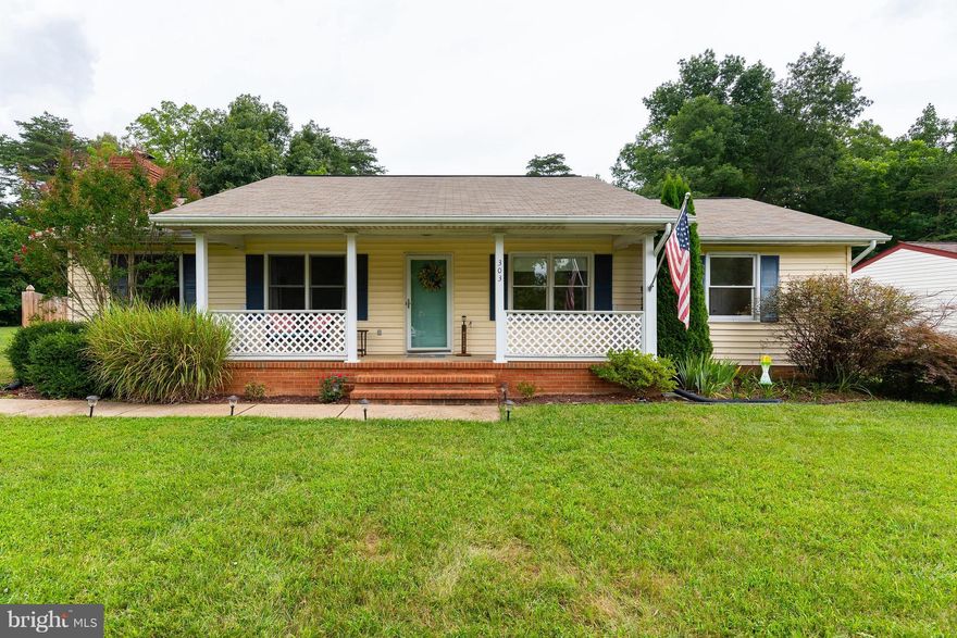 One level living at its finest! Charming rambler situated on a large lot complete with a country front porch, storage shed, & quiet rear deck that backs to trees. Interior is just as charming & inviting with a spacious floorpan including 2 living areas, an eye-catching sky light, separate dining room (w/ sliding door providing access to the deck), & cozy kitchen. New Trane system just installed!