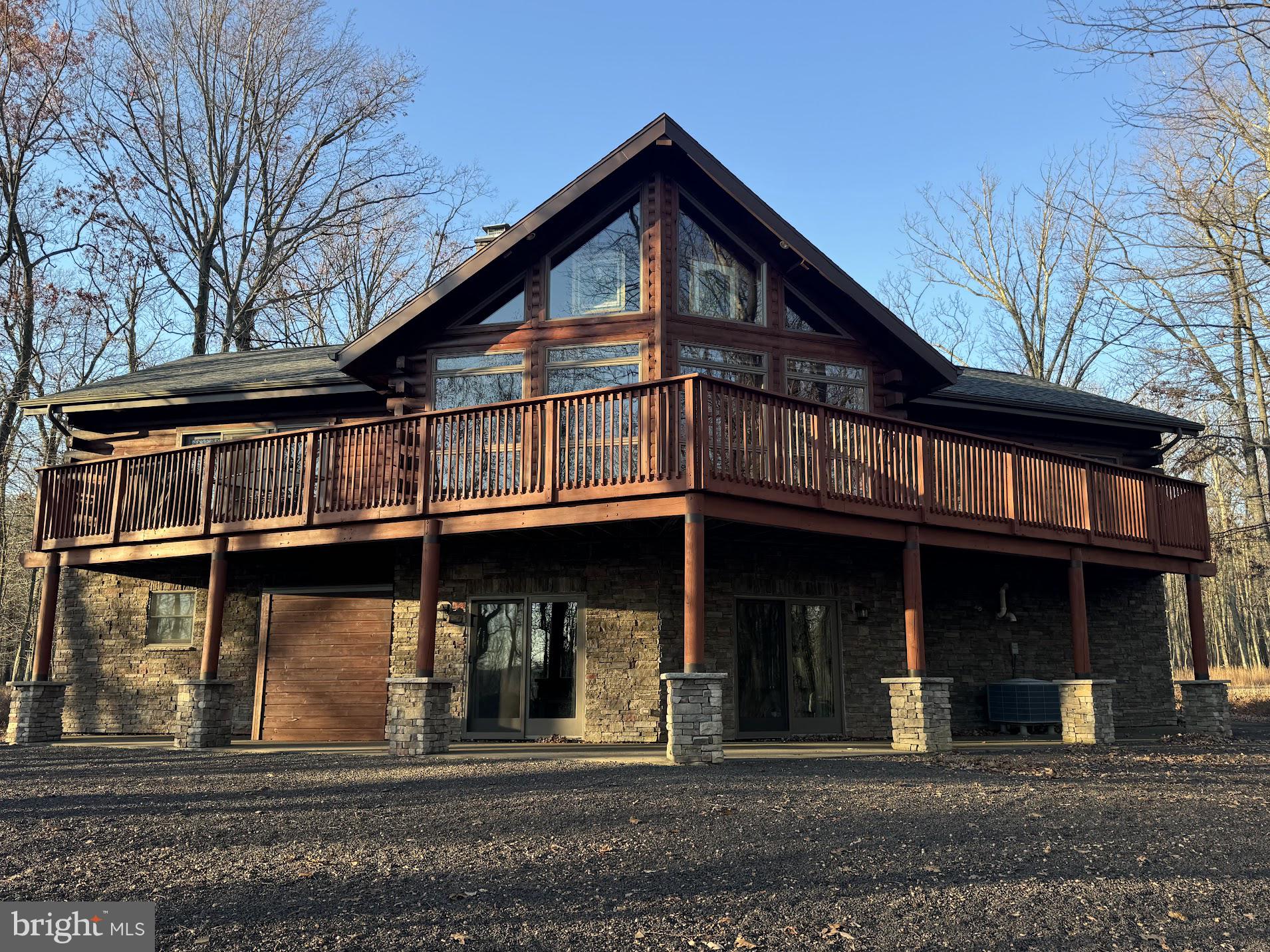 BEAUTIFUL, RAISED RANCH , TURN KEY ,LOG HOME ON 1/2 ACRE LOT , WITH SEASONAL VIEWS OF THE MOUNTAINS AND LAKE. Enjoy the view from you large, private deck, or the comfort of your living room! This open concept , log home features,; floor to ceiling windows in LR, stone kFP, finished lower level with live edge ,custom wet bar, wide plank pine wooden floors, spacious primary bedroom with ensuite and electric FP, water filtration system and so much more!!!
Eagle Rock offers many 4 season amenities; 2 golf courses, indoor/outdoor pools, ski, snow tubing, gym, tennis, pickle ball and indoor basketball courts, lake, beach, activity center, equestrian center , spa and more!!! All of these amenities and more for only HOA fee of $1380 per year.
SELLER IS WILLING TO HOLD LOAN AT 4.5% WITH 20% DOWN OR 4% WITH 30% DOWN