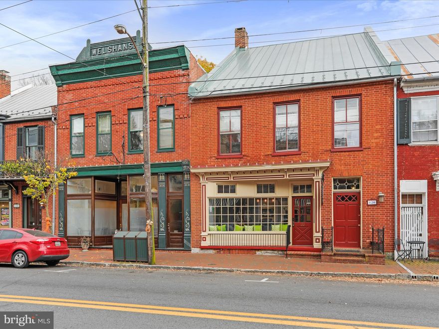 You are looking at one of the most iconic buildings in Historic Downtown Shepherdstown.  Formerly known as Tony's Pizza and Stonewalls Underground Pub, the business shuttered in 2015.  The owner has done extensive exterior and interior restoration and has decided now is the time to put the property on the market.   This is your time to invest in this thriving downtown environment.  Entering the restaurant space on the main level of 126 E. German St., you will find historically preserved hardwood floors adorning the huge open dining space with small bar tucked in front of the fully equipped commercial kitchen with everything needed to open immediately.  Travel downstairs and you will find the stone walls of Stonewall's Pub featuring a 30+ foot bar, fully equipped and ready to open, large dining, open space, DJ booth, and rear exit stairs leading out the back private entry.  Included in the sale is 122 E. German St, currently rented to a local Architectural Firm and in fantastic shape.  Venture upstairs and you will enter history.  A magnificent huge residential home sits atop the entire space and carries the address of 120 E. German St.  Featuring soaring ceilings, trim from yesteryear, hardwood floors, and so much more, this 2 BR space is just amazing.  The residential space does need some cosmetic upgrades, but has more character than you could imagine.  Outside is where this property really hits home.  The double lot features the largest outdoor eating venue in town and a fenced rear entry to private parking and a two car, two story garage space.  This place is what dreams are made of, but we ask that all dreamers come prequalified and with open eyes ready to be amazed.