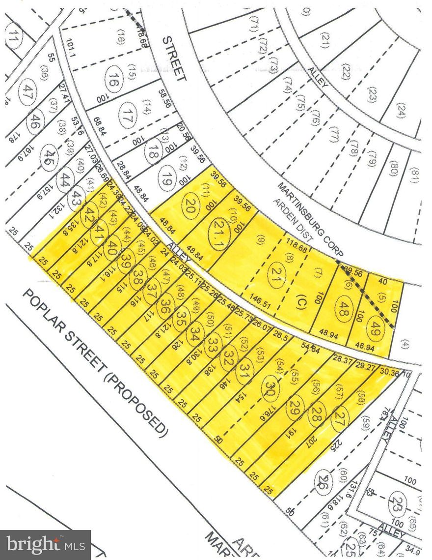 Approximately 2.3 acres comprised of 21 parcels,  most likely created for mobile home use.  Property is presently improved with a 36x34 two-bay shop with service pit, a 14x24 detached office and a rented 60' mobile home.  Buildings are in fair to poor condition.   Located in Berkeley County, bordered by City of Martinsburg on three sides, this property has no zoning.  Water, sewer, power all are all located at the site.  This is a great opportunity to redevelop for multiple multi-units, commercial, mixed use or mobile homes with county approval of purchaser's site plan. Buyer and/or buyer's agent to confirm all dimensions, square footage, taxes, etc...  Seller and seller's agent not responsible for buyer's due diligence.