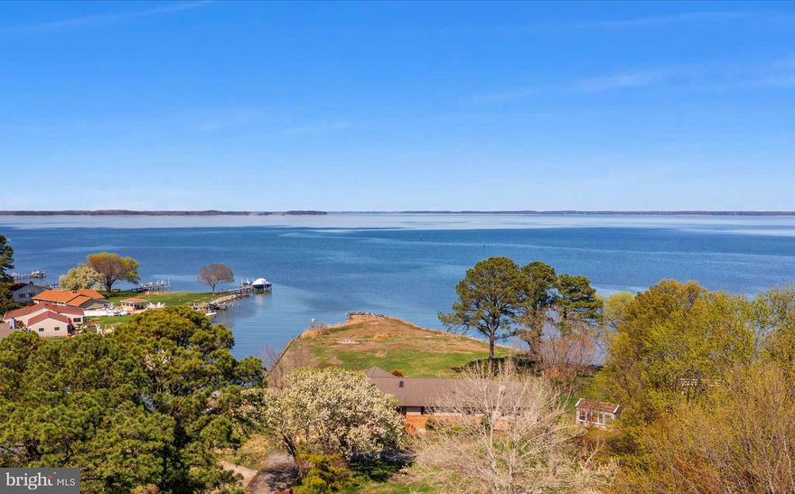 SUMMER IS HERE! Beat the heat.... Enjoy this Incredible TWO ACRE WATERFRONT Property on the Eastern Shore! Conveniently located at the Kent Narrows and the Kent Island Cross Trail!  RARE OPPORTUNITY to OWN this kind of Acreage on DEEP WATER where you can enjoy the SUNRISE AND the SUNSET! No HOA here on this very unique property, so short term rental is possible!  Sprawling 4 BR, 2.5 BA Rancher with a 2 car attached Garage, Detached Outbuilding and a Greenhouse for the gardener in you! All NEW neutral Paint and Carpet, detailed Clean and ready for you to make it your own. Stunning knotty pine cathedral ceilings, open floor plan and large bedrooms with plenty of space to entertain. There is a 3 seasons room to take in all the VIEWS and it's the perfect spot for those crab feasts!  NEW spacious maintenance free deck to relax and sunbath, grill your fresh catch of the day and take in the nature abound... Seagulls, Blue Herons, Ospreys and Bald Eagles! Property includes your very own boat ramp to drop your boat, kayak or SUP board in the water. Jackson Creek flows into the Chester River and is a Boaters delight with a short trip to the Narrows, St. Michaels, Oxford, Rockhall, Chestertown, Annapolis and more! Perfect for a Family Compound, Get-Aways, Short Term Rentals, Summer and Weekend Home! Close to shopping, dining, parks, beaches, marinas, trails and is easily accessible to Rt 50.