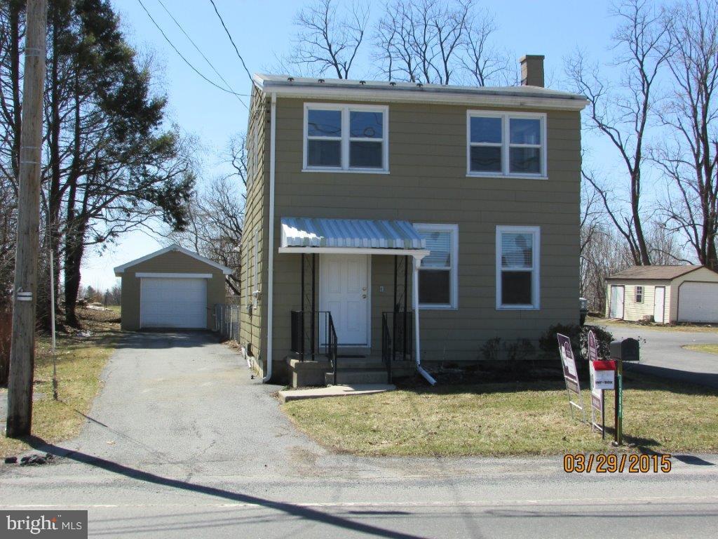 Remodeled 3 bedroom 1.5 bath single family home with first floor laundry, large eat-in kitchen, flat rear yard and a detached garage.