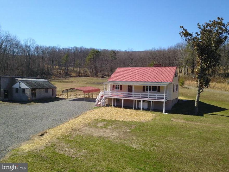 Rawlings, MD – Totally Restored & Remodeled Family Farmhouse Perched on 18+ Flat Gentle Rolling Acres w high Traffic Volume on US Rte #220. Large Front Covered Porch leads to roomy Interior which includes Eat-in Kitchen w All New Appliances, Granite Countertops, & Ceramic Tile Floors. Living Room offers New Laminated H-Wood Floors, (2) Bedrooms & Full Bath w New Shower/Tub Combo.  2 Bedrooms and Full Bath on 2nd Flr.  Full Unfinished Basement w Exterior Access. Other amenities: Large Detached Garage (TLC), Carport, Workshop, 2 Separate Front Lots with Water/Sewer and Underground Electric, Vinyl Siding, Oil, Propane & Electric BB Heat.  This is a Multiple Use Property with Excellent Potential for Additional Income.  Call for more info, you won’t Regret it!