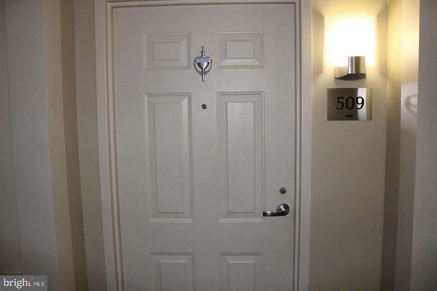 Welcome to elevated living at The Carlton House in the heart of Reston. This beautifully maintained and secure building offers the perfect blend of comfort, convenience, and luxury.

This stunning 1-bedroom condo is freshly painted and move-in ready, featuring numerous recent upgrades, including a 2-year-old HVAC system, water heater, and disposal, ensuring peace of mind for years to come. The bedroom boasts newer flooring (2 years old), while stylish vinyl flooring flows throughout the rest of the home. Enjoy enhanced efficiency with an upgraded energy-saving toilet and a sleek, modern bathtub enclosure.

Designed with entertaining in mind, the open floor plan offers seamless flow and abundant natural light. The enclosed sunroom overlooking mature trees provides the perfect space for a home office, reading nook, or simply relaxing with your morning coffee. The spacious primary bedroom includes a generous walk-in closet for ample storage.

Residents of The Carlton House enjoy exceptional amenities, including a rooftop pool, fitness center, billiards room, concierge service, and secure entry—everything you need to unwind after a long day. The unit also includes one dedicated garage parking space.

Located just steps from both the Wiehle-Reston East Metro Station and Reston Town Center Metro Station, commuting is effortless. You’re also within walking distance to premier shopping, dining, and year-round events at Reston Town Center.

This is more than a condo—it’s a lifestyle. Don’t miss your opportunity to call this exceptional home yours!