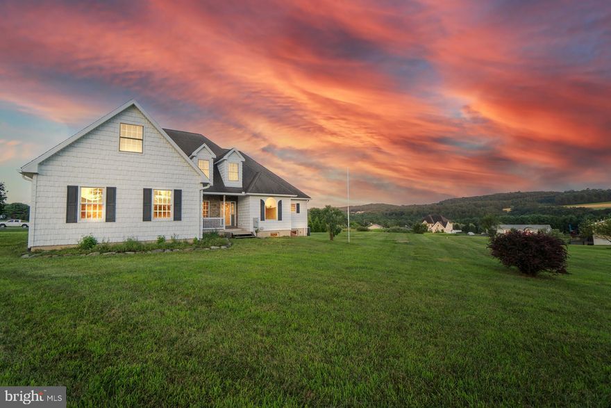 125 Hillview Verbiage. Charming 4-Bedroom Home with Stunning Mountain Views. Located in a peaceful neighborhood in the heart of the Pocono Mountains, this spacious home sits on a picturesque 1-acre corner lot with breathtaking views and room to relax, entertain, and explore. The first floor features a large primary bedroom with large, private ensuite bath and cozy fireplace, a sunroom filled with natural light, a dedicated home office, and a spacious eat-in kitchen perfect for gatherings. The great room, complete with a charming fireplace and 18 foot ceilings is the perfect spot to relax and unwind. A formal living room, elegant dining room, and convenient powder room add to the home's ideal layout for both entertaining guests and everyday comfort. A well-equipped mudroom with shower/bath is perfect for outdoor cleanup or pet care. Upstairs offers three additional bedrooms and a full bath, plus a massive expandable walk-in attic for ample storage. The partially finished basement provides extra living space with a large family room, bar area, or rec room space as well as HUGE unfinished space perfect to finish or use as storage. Enjoy evenings around the fire pit while soaking in sweeping Pocono views. Situated near major roadways like Route 209 and PA Turnpike 476, this location offers easy eastward travel for commuting, shopping, or weekend getaways. Conveniently located near Jim Thorpe and Beltzville State Park. A rare blend of comfort, character, and natural beauty.