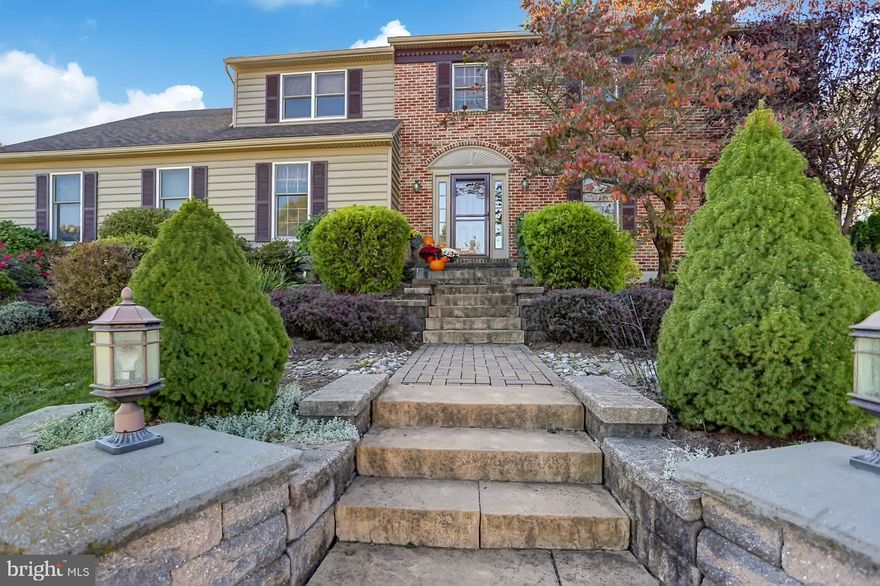 Every once in a while an absolutely perfect property comes along and this is it! Your search ends at 2020 Gring Drive. Imagine your dream home at an affordable price in the heart of the sought-after Wilson School District just minutes from shopping, schools, hospitals, and highways and only steps from Drexelwood Park. The spectacular curb appeal gives you a hint of what to expect inside. But first, take a walk around the exterior . . . there's a ton of stonework (drywalls and patios), a secluded deck, two covered entertaining areas, mature landscaping, and a waterfall. The roof was installed in 2015 along with the upgraded bead siding. Step inside and hold on, because you've never seen a Drexelwood house like this before now. The owners added square footage to the rear of the building and the result is a custom, open floor plan with tons of surprising space. Okay, where to start? There are so many custom features: gleaming Santos mahogany floors, recessed lighting, chair rail, wainscotings, crown moldings and this is just in the foyer!! Need a home office? Well, this place has the perfect space, conveniently tucked away near the front entrance, with an entire wall of built-in bookshelves. Now catch your breath as you make your way into the kitchen. Seriously, this is the quality of kitchen you would find in a million dollar house. The top-of-the-line Plain & Fancy cabinetry (54 handles) is beyond compare; the granite impressive, and the three sinks practical. The appliances are super high end with a Miele built-in dishwasher, an additional Fisher dishwasher drawer, a KitchenAid warming drawer, a Viking 36  six burner stove, a Subzero refrigerator, plus an extra mini fridge in the butler s pantry. There is a built-in settee with even more built-in bench storage,  huge walk-in pantry, and a separate utility closet. Truly, this is a gourmand's dream kitchen. The first floor family room has a built-in shelving around the fireplace that houses a wood insert stove. There is also a sunroom off the back of the house that has entrances from both the kitchen and family room. Upstairs, you'll find the master bedroom with a massive dressing room/closet (yes, there are even more built-ins here), plus an impressive master bathroom. The shower has four different jets/zones and the floor is heated to keep your tootsies toasty. There are two additional full baths on the second level (one in the hallway and one en suite). Don't forget that the basement is also finished with a full recreation area that includes a stone hearth (gas fireplace) and a full bar. There is a huge unfinished area for utilities and future expansion as there is an outside entrance. The two-car garage in oversized with a huge additional storage area, plus there is a pull-down stairs with access to the attic. The driveway easily fits five cars and there is storage shed. This description could go on and on, but really this is a house you need to see to appreciate.