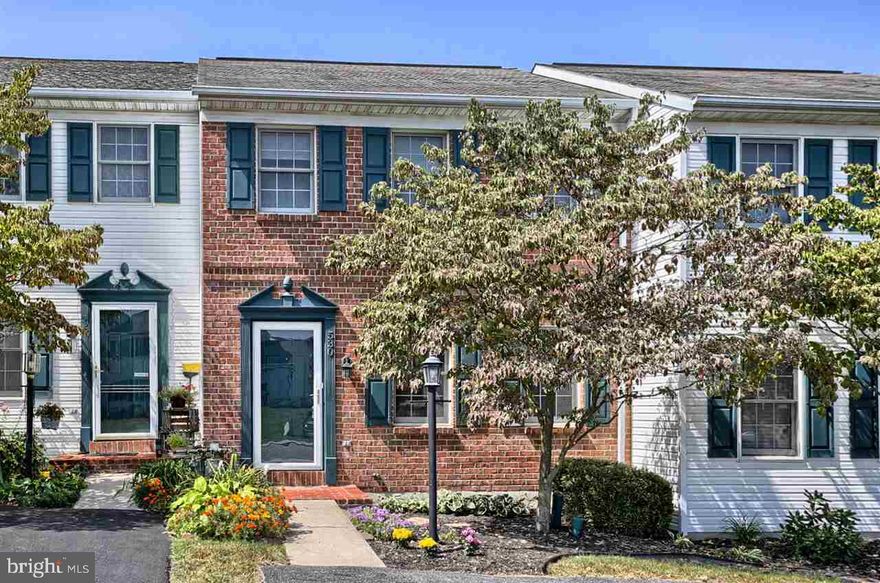 Turn key town home in popular Woodmont Estates. Spacious floor plan w/brand new hardwood floors throughout 1st floor. Finished walkout basement w/gas log fireplace. 1st & 2nd floor rear decks w/ picturesque views. Conveniently located less than 1 mile from I83 & Rt. 30!