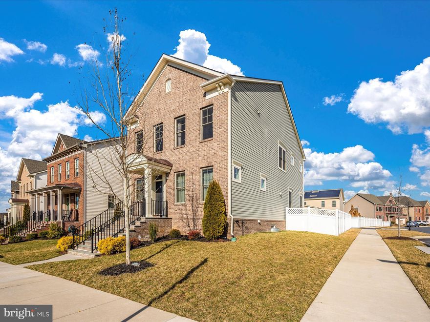 Beautiful brick front home situated on a corner lot in the sought after Landsdale community! Built in 2017, this Winchester Homes Barrington model has beautiful hardwood flooring, a stunning kitchen with stainless steel appliances, granite countertops, and a large island! On the main level you’ll also find a large mud room with laundry, half bath, large dining room and living room. Upstairs features 4 spacious bedrooms with upgraded tile and shower in the primary bath. A fully finished and updated basement w/ full bath, and lots of open space for another family room, office, or play area! Attached rear-facing 2 car garage, and fenced yard. BRAND NEW PATIO approximately 1.5-year-old, great for entertaining! There is plenty of space for everyone in this 4000 sq ft home! Landsdale offers lots of amenities, including a community pool, clubhouse, walking trails, playgrounds, and more! Brand new elementary school is coming to the area in Fall 2025. Don’t wait! Schedule today.