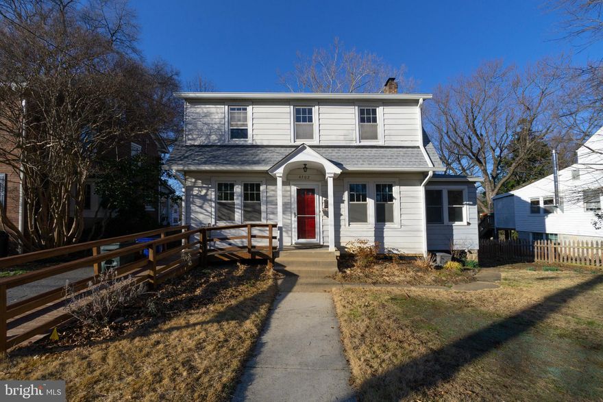 From the moment you pull up to 4302 Sheridan, you know you are home.  Colonial Architecture with an arched portico covering the red front door welcomes you into the spacious living room, complete with built-in shelving, a brick fireplace, and completely refinished hardwood floors.  Flanking the fireplace are two glass panel doors that lead to the den/office that has been freshly painted and carpeted.  The den has glass french doors leading to a small deck area. The living room also leads directly into a separate dining room with loads of window light, refinished hardwoods, and plenty of space for a buffet server in addition to a table.  The kitchen has been opened up to the breakfast nook that overlooks the sun-sprinkled rear gardens.  Also on the main level is a bathroom/bedroom combination.  The bedroom could also be used as a den or other living space.  This room also has outside access.  
Upstairs the rooms have all been painted, and the hardwood floors refinished, as well as new light fixtures installed.  The windows let in a lot of light, and even though there are radiator heaters, there is also air conditioning supplied to all rooms.  The bathroom is large and styled in the original intention of the home, and features built in storage and a large cast iron tub.  
The basement has a bedroom that has also been freshly painted and carpeted, and has it's own separate bathroom as well as outdoor access.  
The backyard is BEAUTIFUL in the spring, with loads of flowers and blooms.  There is a side garden that gets good light for growing vegetables, herbs, etc.  The brick patio is an amazing entertaining space, just waiting for a summer garden party.  

***2024 NEW FURNACE***
***2024 NEW ROOF, GUTTERS, AND DOWNSPOUTS***

Don't sleep on this classic, stunning University Park charmer!!!  You will love the quiet walks through the tree lined streets and through the creek walkways. <3