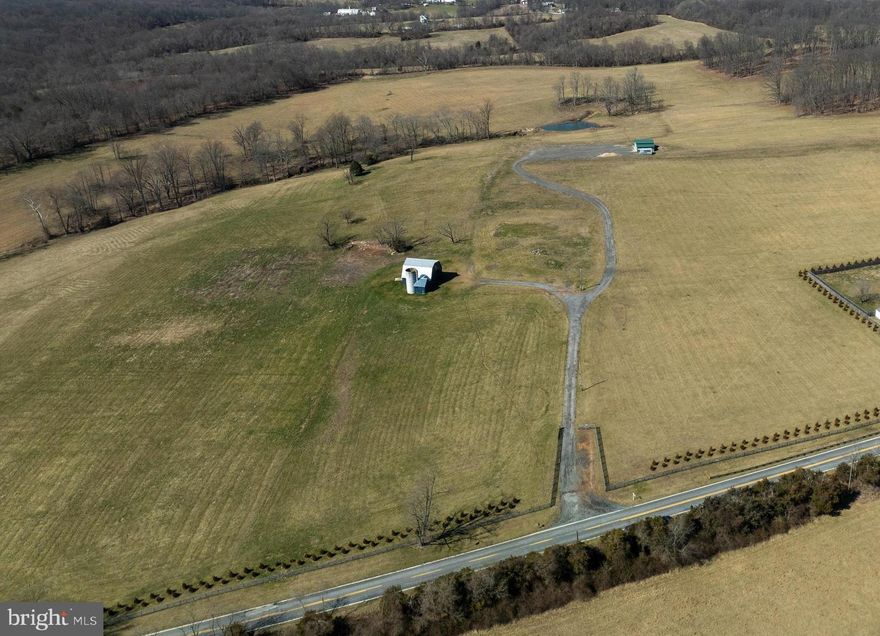 75.73 +/- acres. Potential "family compound".  Three perc sites for potential future houses (one 6-bedroom, one 4-bedroom, plus 3rd perc site). Over 500K in improvements since purchased by current owner (including barn refurbishment, land clean-up and clearing, fencing installations, and planting of trees at fence-line for aesthetics/privacy).  Located in Ag Reserve,  with no restrictive agricultural easements.  Property located across the street from County parkland.  Picturesque setting.  Pond and stream located on the Property, plus some woods.  (Expansion study done regarding pond). Large barn for storage, with electric and operating water well.   Also  an oversized three-bay garage for  vehicles/storage with large adjacent parking area. Primarily open ground,  front-gated.  Five minute drive to Clarksburg outlets and I-270, 10-15 minutes to Sugarloaf Mountain, 3 minutes to Route 355/Frederick Road. Excellent opportunity.  Subdividing potential.  Buyer to perform its due diligence to confirm Property suited for Buyer's intended purposes.