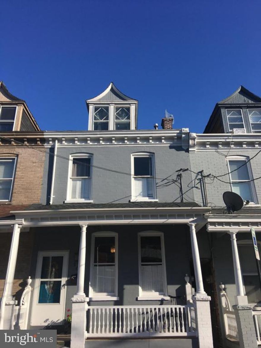 Very well updated city rowhome, new kitchen and bath, large backyard with custom deck. Central Air.