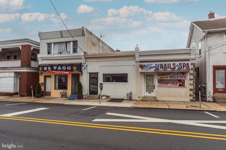 Prime mixed-use property in a high-traffic commercial hub. The front unit is currently configured as a restaurant, offering immediate business potential, while the rear includes a residential apartment with dedicated parking. Strong income opportunity, operate your own venture or lease both units for dual rental income.