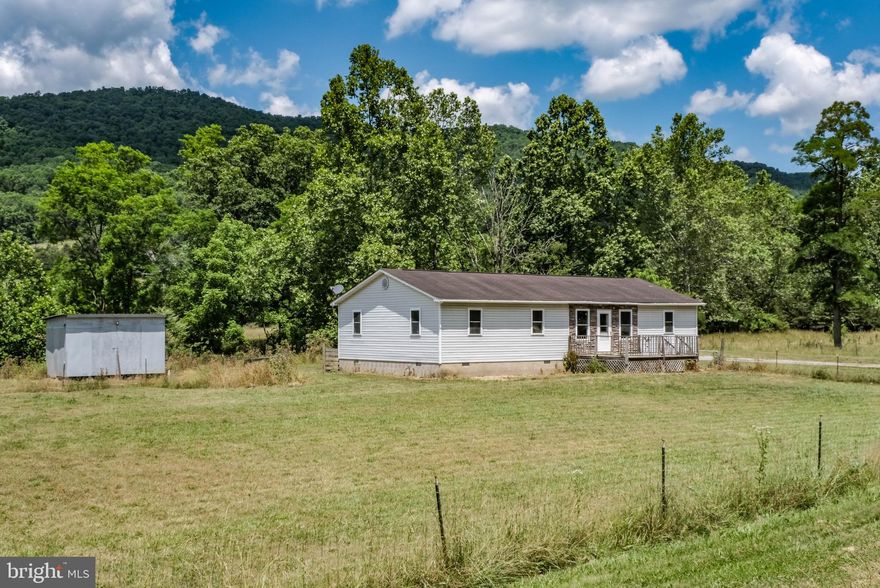Country Living, On 1.76 Acres, Mountainous Views, Creek! 5 Bedrom, 2 Bath, Stick Built Home, Situated In Hardy County Just A Few Miles From Rockingham County Line!  Flat Yard, Flat Open Field, Partially Fenced
High Speed Internet Available! This Home Was Stick Built By The Seller Himself, Open Spacious Floor Plan, Average Size Bedrooms, Wide Hallways, Spacious Primary Bedroom And Bath. Home Needs Some Cosmetic Updates. Home Is Sold As-Is. Currently The Home Is In A Flood Plain-Flood Plain Is In Appeal And In Review. Call County To Find Out About The Details-This Is New, As The Home Was Not Previously Zoned In Flood Plain. Call Your Insurance Company For Quotes.