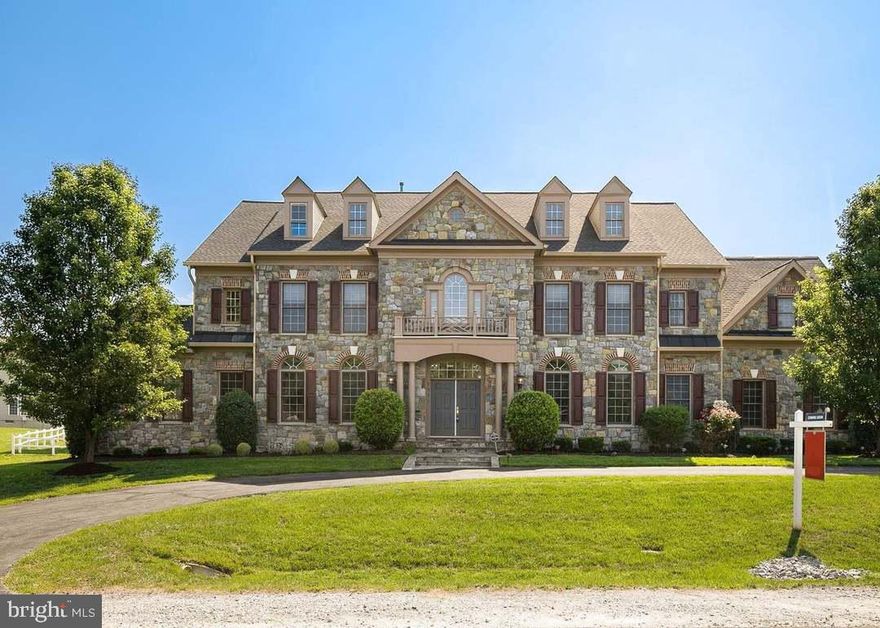 FULLY RENOVATED LUXURY HOME IN THE HEART OF LORTON! This stunning 4-level residence offers 6 spacious bedrooms and 7.5 bath, highlighted soaring 24-FT CEILINGS and high-end finishes throughout. Enjoy true resort- style living with exceptional indoor and outdoor spaces designed for both comfort and entertaining -all in a prime location just minutes to I-95 for an easy commute.

• HEATED POOL & HOT TUB SPA
• PRIVATE FENCED BACKYARD
• EXPANSIVE PATIO – PERFECT FOR ENTERTAINING
• 4 FINISHED LEVELS WITH GENEROUS LIVING SPACE
• DEDICATED THEATER ROOM
• 6 BEDROOMS | 7.5 BATHS
• GRAND 24-FT CEILINGS
• WALKING DISTANCE TO THE OCCOQUAN RIVER FROM THE END OF THE CUL-DE-SAC
• MINUTES TO I-95 – IDEAL FOR COMMUTERS

A rare blend of ELEGANCE, SPACE, LOCATION, AND MODERN UPGRADES—THIS HOME TRULY HAS IT ALL!

From the moment you enter, you are welcomed by abundant natural light pouring through oversized windows, highlighting the home’s elegant design and spacious open layout. Freshly painted interiors, new flooring, and luxurious finishes create a sophisticated yet comfortable living experience. The main level showcases beautiful tile flooring, while the basement features luxury vinyl flooring designed for both style and durability. Plush new carpeting on the bedroom level adds warmth and comfort to the private living spaces.

Designed for both entertaining and everyday living, this home offers incredible flexibility and functionality. The expansive basement is an entertainer’s dream featuring a huge custom bar, home theater, gym area, indoor recreation/play space, and ample room to host gatherings of any size. Every room has been designed with space and comfort in mind, allowing everyone in the household to enjoy their own private retreat while still offering wonderful spaces to come together.

A main-level bedroom with an attached full bath provides the perfect option for guests, multigenerational living, or a private home office. The spacious layout flows effortlessly throughout the home, making it ideal for celebrating holidays, entertaining family and friends, or simply enjoying peaceful everyday living.

Step outside into your own private oasis featuring beautifully landscaped grounds and a fully fenced backyard designed for both privacy and relaxation. The fence and pool with jacuzzi were newly constructed in 2021, creating an incredible outdoor setting perfect for summer enjoyment and entertaining. Surrounded by mature trees and nature, you’ll wake up to birds chirping in the morning and enjoy the peaceful charm of this quiet, established neighborhood where children can safely play outdoors.

Located just a short two-minute walk from the beautiful Occoquan River, this home offers a rare opportunity to enjoy nature, tranquility, and luxury living all in one. Conveniently situated near highly rated schools, major commuter routes, shopping, dining, and parks, this property combines elegance, functionality, and an unbeatable location.

This is more than just a home — it’s a lifestyle of luxury, serenity, and timeless comfort.