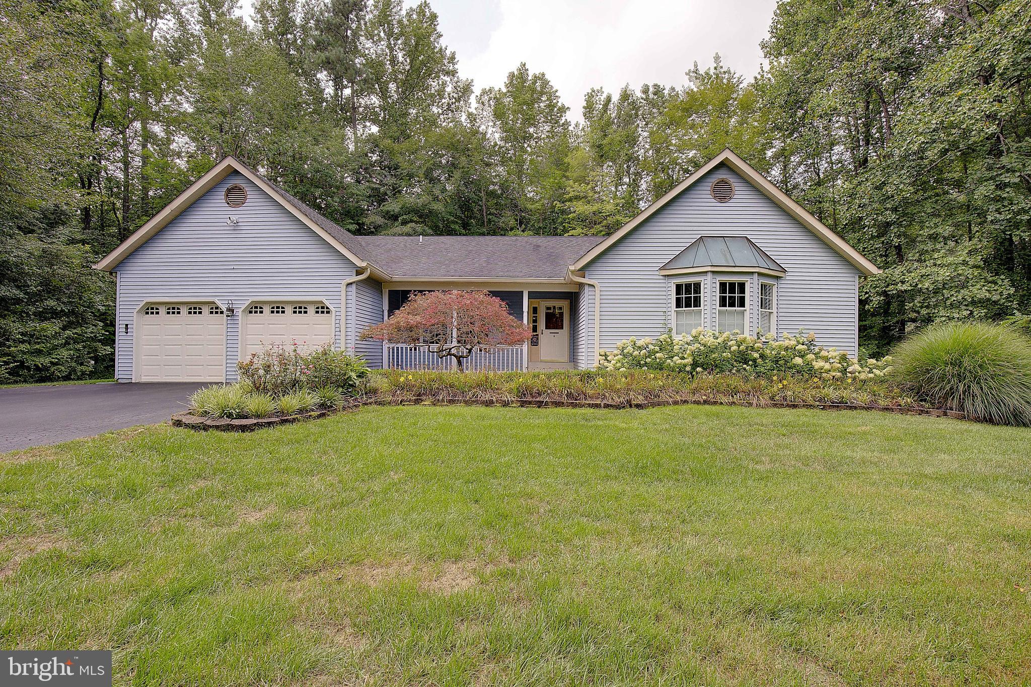 Discover serenity in this charming one level, 4 bedroom, 2.5 bath home located at the end of a peaceful cul-de-sac in desirable Huntingtown!! This home is bigger than it looks and expands over 2,400 square feet of living space! The home was meticulously loved and cared for by one owner and offers a perfect blend of comfort and style! With a welcoming floor plan and spacious interior, your new home awaits, offering both privacy and a strong sense of community surrounded by mature landscaping! Enjoy outdoor relaxation on the rear patio, complete with an awning for shade! The kitchen seamlessly flows into the large family room, ideal for family fun and entertainment! Additional features include plantation shutters, custom built-in cabinetry in the spacious garage and updated primary bathroom! Schedule your showing today! This property won't last long!!
