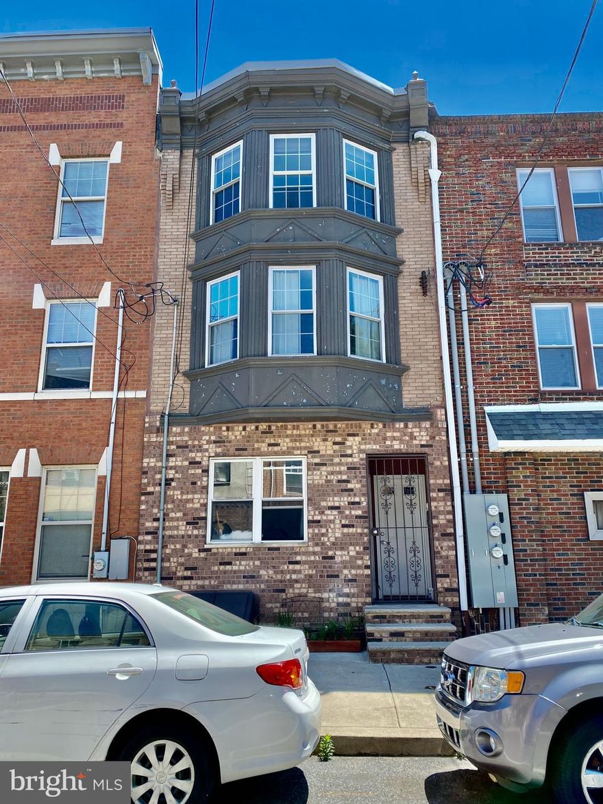 Great income producing property in BELLA VISTA!  Three very nice 1 Bedroom, 1 Bathroom Units have separate utilities with an annual income of $54,300.  Fully occupied.  All Units have Hardwood floors, granite countertops, stainless steel appliances, Washer/Dryer in Units, Central Air, and outdoor space.  The 1st floor Unit has a Yard, and the 2nd and 3rd floor Units each have a rear Deck.  1st Flr - $1,500 (yearly lease), 2nd Flr - $1,400 mo-to-mo (under market value), 3rd Flr - $1,625 (yearly lease).  The Basement can be a great Owner's space with access from the exterior Bilco doors.  This is a great investment property in a great location, close to public transportation, the Italian Market, Center City, many restaurants, and much more!  Please inquire!!!  Photos are of the 1st & 3rd Flr Units prior to Tenants.