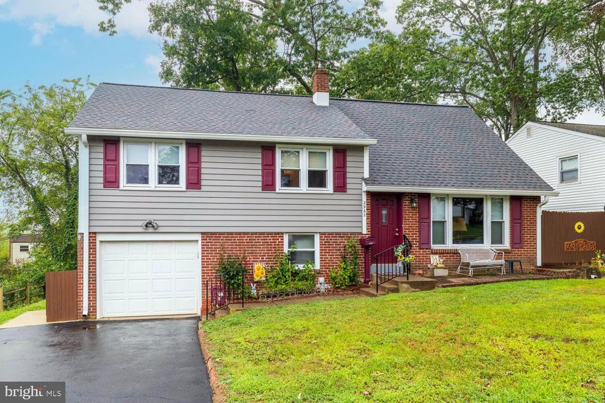 When you drive up you say "I'm Home" Beautifully maintained 4 bedroom 2.5 bath split level "with personality" Hardwood floors throught (except fam. rm) Replacement windows with attractive bay/garden window in Dining Rm. Fam. Rm. has elegrant wood slider to generous yard and patio (22x9) Enter the elegant Living Rm with huge front window and generous coat closet. The Dining Room has a wonderful bay window, and is adjacent to the beutifully updated kitchen with SS appliances, updated counters even on the breakfast bar, and stately wood cabinets with elegant trim, pantry, built in microwave and5 burner gas stove.  A few steps up to bedroom area with 3 generous bedrooms and closet space. Main Bedroom has an updated master bath with stall shower & pedestal sink. The ceramic tile hall bath with tub and updated surround complete with pedestal sink. The hall houses a convenient linen closet. The upper level has the 4th bedroom with supersized closet and easy access to the attic. Lower level is fully finished with a half bath and laundry/utility room and access to crawl space.  And indoor access to the spacious one car garage.There is an exquisite wood slider to the 22' patio and picturesque yard.
Generator with separate electrical panel.  Several ceiling fans. Move in Condition. Ideal location  1 mile to rail station, buses on fitzwatertown rd. convenient to parking, recreation, and cultural venues.