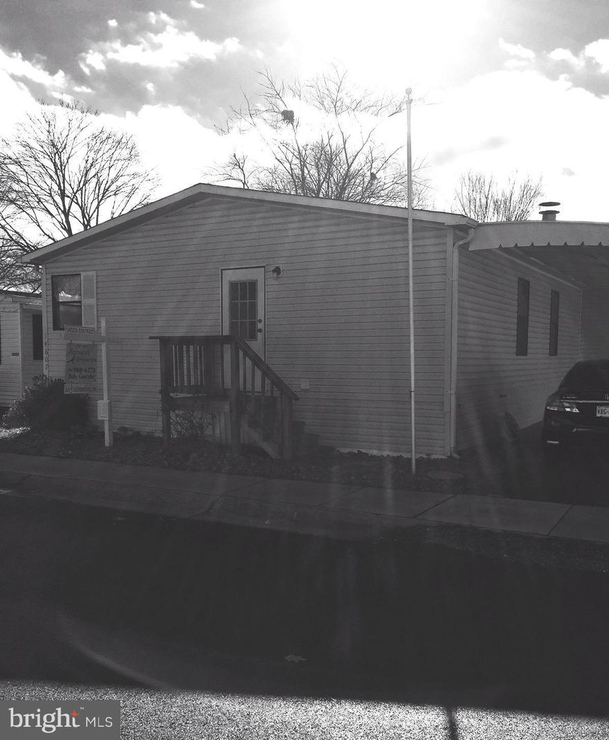 Spacious 1992 Clayton Elkton Manufactured home!  3BRs 2BAs, huge kitchen, separate dining room, cozy wood burning fireplace, large bedrooms with plenty of closet space, soaking tub and separate shower in master, convenient carport and bonus sunroom.  The list goes on and on!  Community Amenities - pool, fitness center, basketball courts, tot lot, PM security, trash and snow removal, lawn mowing!