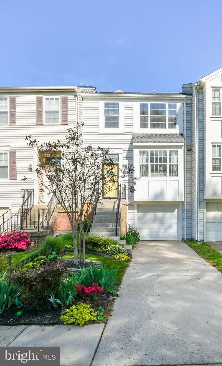 Welcome to this beautifully updated and well-maintained 3 bedroom, 2.5 bath townhome with fully-fenced private patio and 3 finished levels in the Franklin Glen community. This home’s floorplan offers plenty of natural light and is perfect for entertaining and relaxing. The main level includes an updated kitchen with a pantry, dining area, living room, and powder room on beautiful hardwood floors. A large deck off the living room extends your entertaining and living space. The upper level features 3 bedrooms and 2 bathrooms. The primary bedroom offers dual closets and an updated bathroom. The lower level provides the perfect place to gather, relax, and unwind.  It offers a flexible rec room space, walk-out access to your patio and easy access to your garage and laundry room.  A private, fully-fenced backyard with landscaped patio backing to an open common area complete this lovely home.  Neighborhood amenities include hiking/biking trails, tennis/racquetball courts, playgrounds, and a community swimming pool, many of which are just adjacent to this amazing home. Updates and upgrades to this home include Roof, Siding, and Deck (2018), HVAC (2018), Water Heater (2019), Kitchen Appliances (2021), Garage Door (2023), Washer (2025), and new whole-home electrical panel to allow for expansion and EV charging if desired (2025). Convenient to shopping, dining, schools, and commuter routes. All that is missing is you!