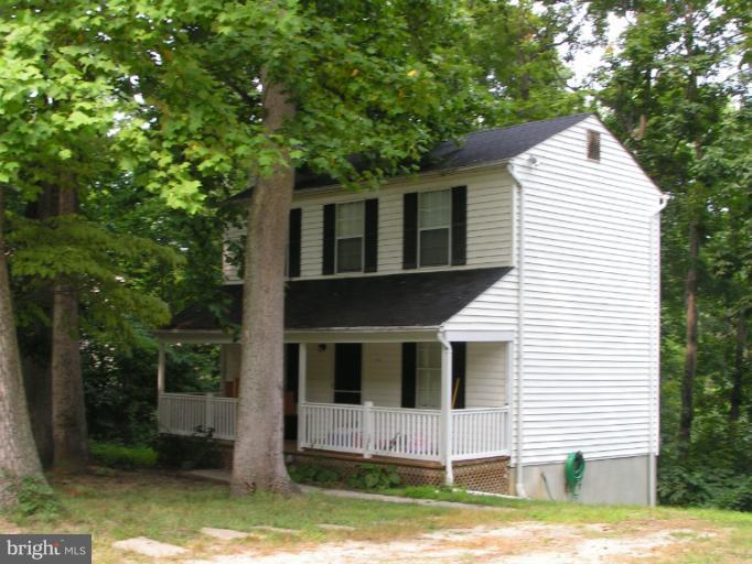 2 Bedroom 1 Bath Home With an Unfinished Basement. New carpet. Main Floor Has a Living Room and an Eat In Kitchen. Upper Level has 2 Bedrooms and a Full Bath. Washer & Dryer in Basement, Deck off of Kitchen, Heat Pump, central A/C and covered front Porch.