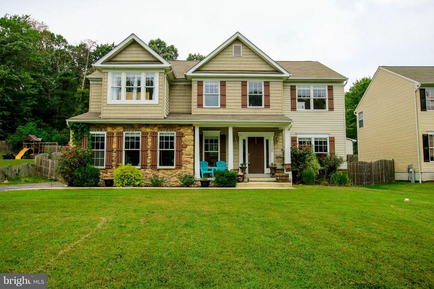 MUST SEE!! Large colonial on half acre w/4-5bed & 3.5ba, 2 car garage in water privilege community. Eat-in kitchen w/42" cabinets and granite countertops opens to FR w/gas fireplace. Owner's retreat offers cozy fireplace, his-her closets, sitting area, jetted tub. Finished basement has wet bar, 5thbed/bonus room & full bath. Oversized deck connected to salt water pool is perfect for entertaining!