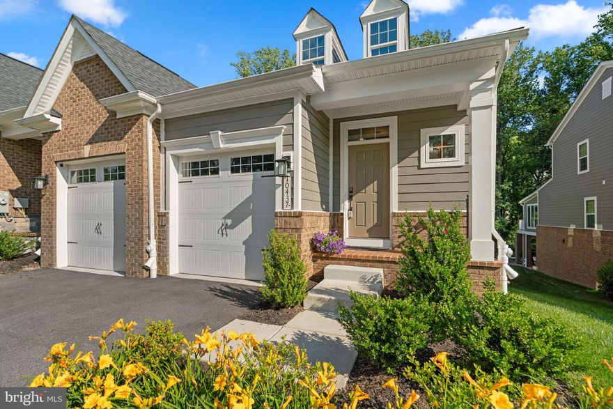 Welcome to this beautiful end-unit colonial in the highly desired Turf Valley community offering 4,014 square feet of living space, including 4 bedrooms, 3 full baths, 1 half bath, and a 2-car garage! Enter through the grand foyer's arched hallway into the exquisite main level, featuring regal beam detailing and gorgeous hardwood floors throughout the chef’s kitchen, dining area, laundry room, half bathroom, and family room with an eye-catching floor-to-ceiling stone gas fireplace.
The bright, open kitchen boasts an island breakfast bar, granite countertops, stainless steel appliances, a gas stove, a patterned tile backsplash, elegant pendant lighting, and a pantry.
Additionally, on the main level, find the owner's suite with a large walk-in closet, balcony, and an attached full bathroom featuring dual vanities and a large standing shower with a bench.
The lower level offers a spacious recreation area with walk-out access to the backyard, a fourth bedroom through French doors, and a full bathroom.
Located just minutes from Turf Valley Town Square, Turf Valley Resort & Golf Course, dining, shops, commuter routes, and more, this home is perfectly situated for convenience and comfort.