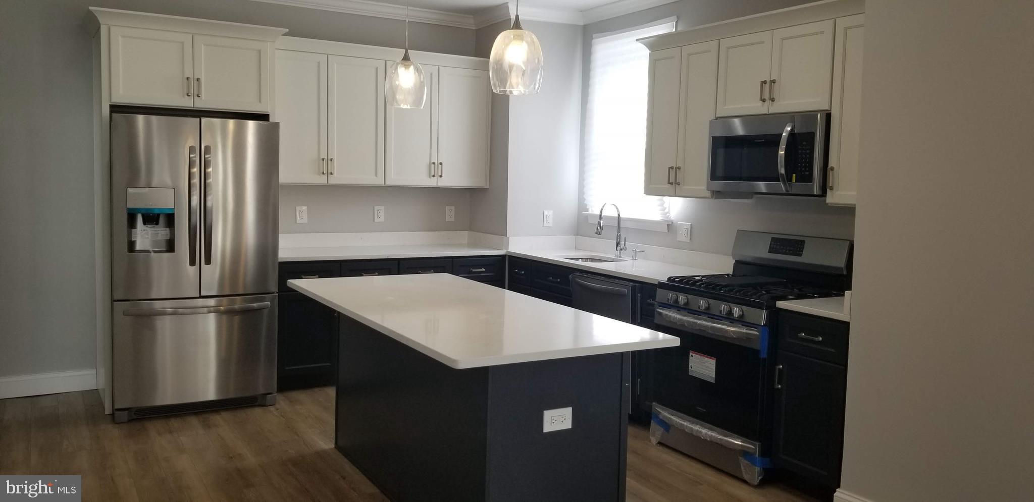 Renovation features Beautiful Kitchen w/soft Close drawers & Quartz Countertops w/beautiful Island & overhang for seating. Master BR w/bath & walk-in closet, Timeless bathroom designs that will suit all buyers. New Insulation & Windows w/double Pane Low E to save you $$$ on your heating & cooling bills. New Plumbing, Electric, HVAC. Huge Backyard, New Roof & closing help available!