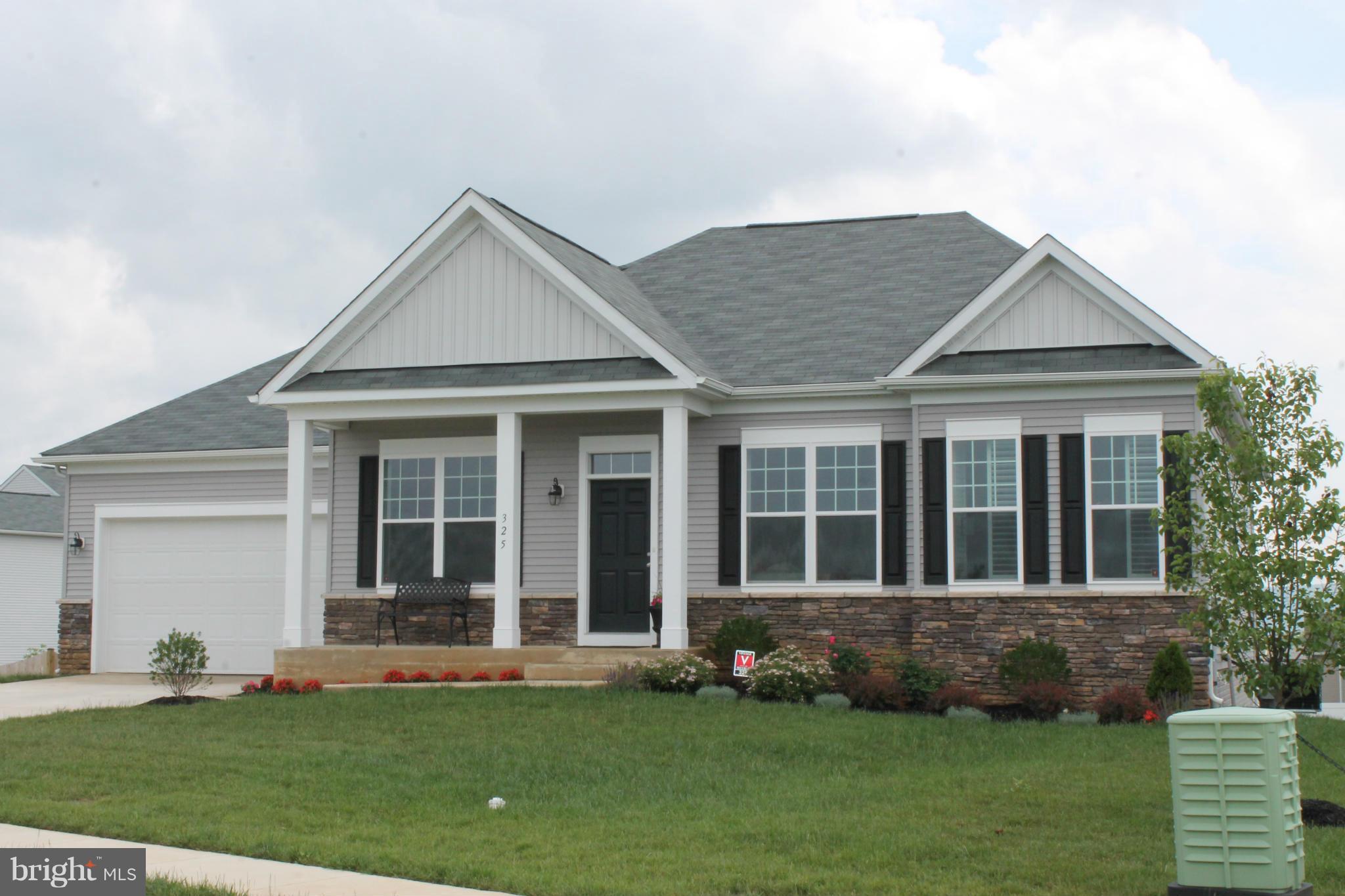 Open and elegant is only the beginning to describe this beautiful rancher. Only 11 months young, this home has all the amenities needed to make it a home.Plantation shutters, cherry cabinetry w/granite tops, stainless steel appliances, 10' ceilings, FP, washer & dryer, hardwood &ceramic floors, full finished walkout daylight basement and a great Trex deck that has an amazing view of the mountains.