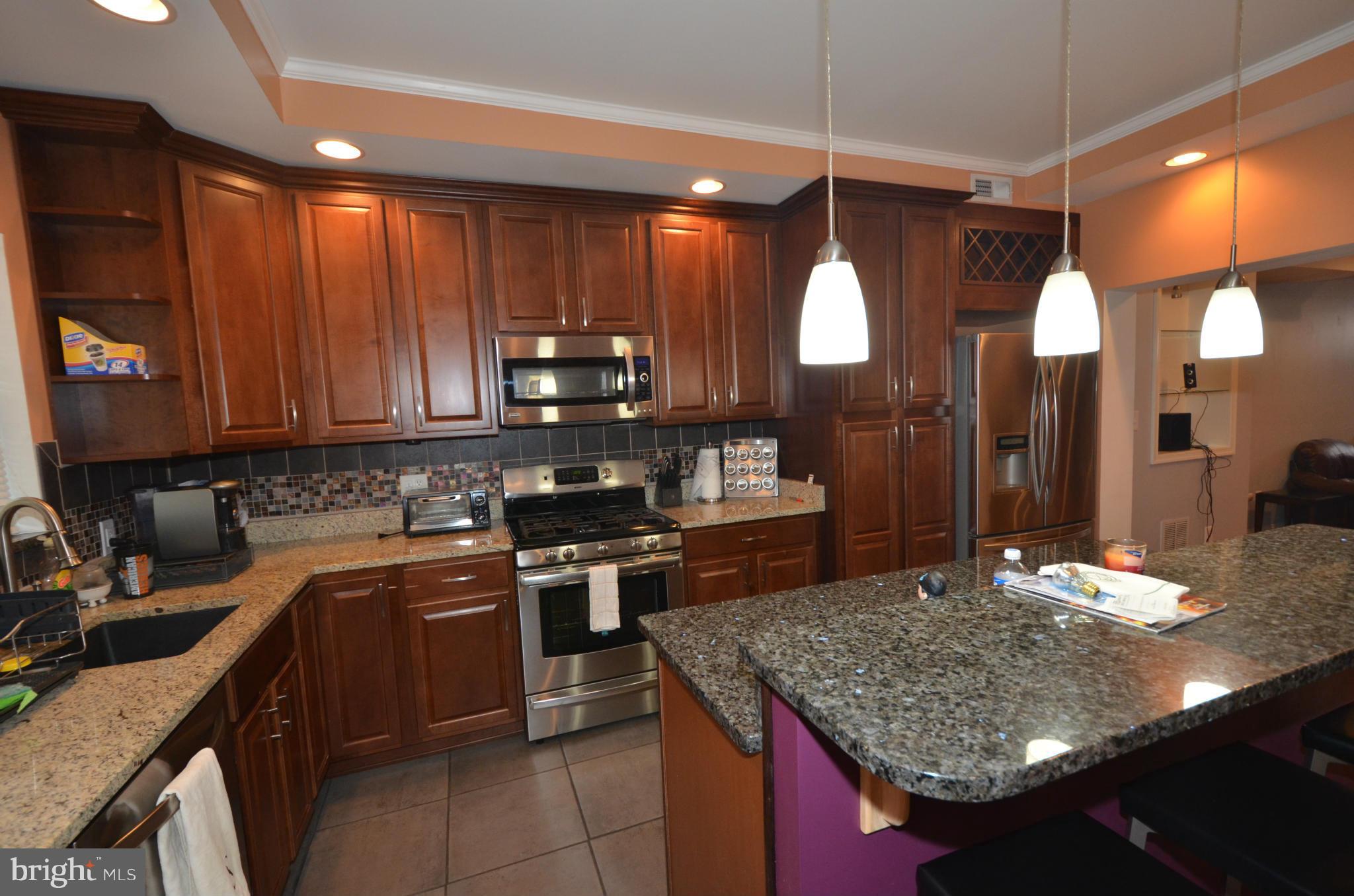 Wow! Hurry to this gorgeous rental in the heart of Brewers Hill! 2 beds, 2 baths, gourmet kitchen, hardwoods, exposed brick, central air,skylights, alarm, stainless steel appliances, w/d, deck off bedroom and PARKING!! No smokers, Pets allowed on case by case basis. Fin.basement with laundry room and tons of storage. Just a few blocks from new Canton Crossing shopping center!!