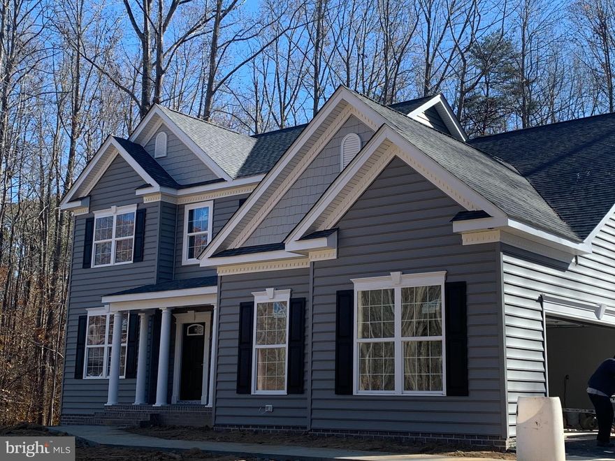 TO BE BUILT ** QBHI's popular Fairfax with a 2.5 car sideload garage, mudroom and built-in bench and cubbies. The house will also include a finished Rec Room in basement, LVP flooring on the main level, an upgraded Kitchen and Deluxe Shower in the Owner's Bathroom. The community has a playground and tennis courts. The clubhouse is under construction and the pool will be built in 2023.