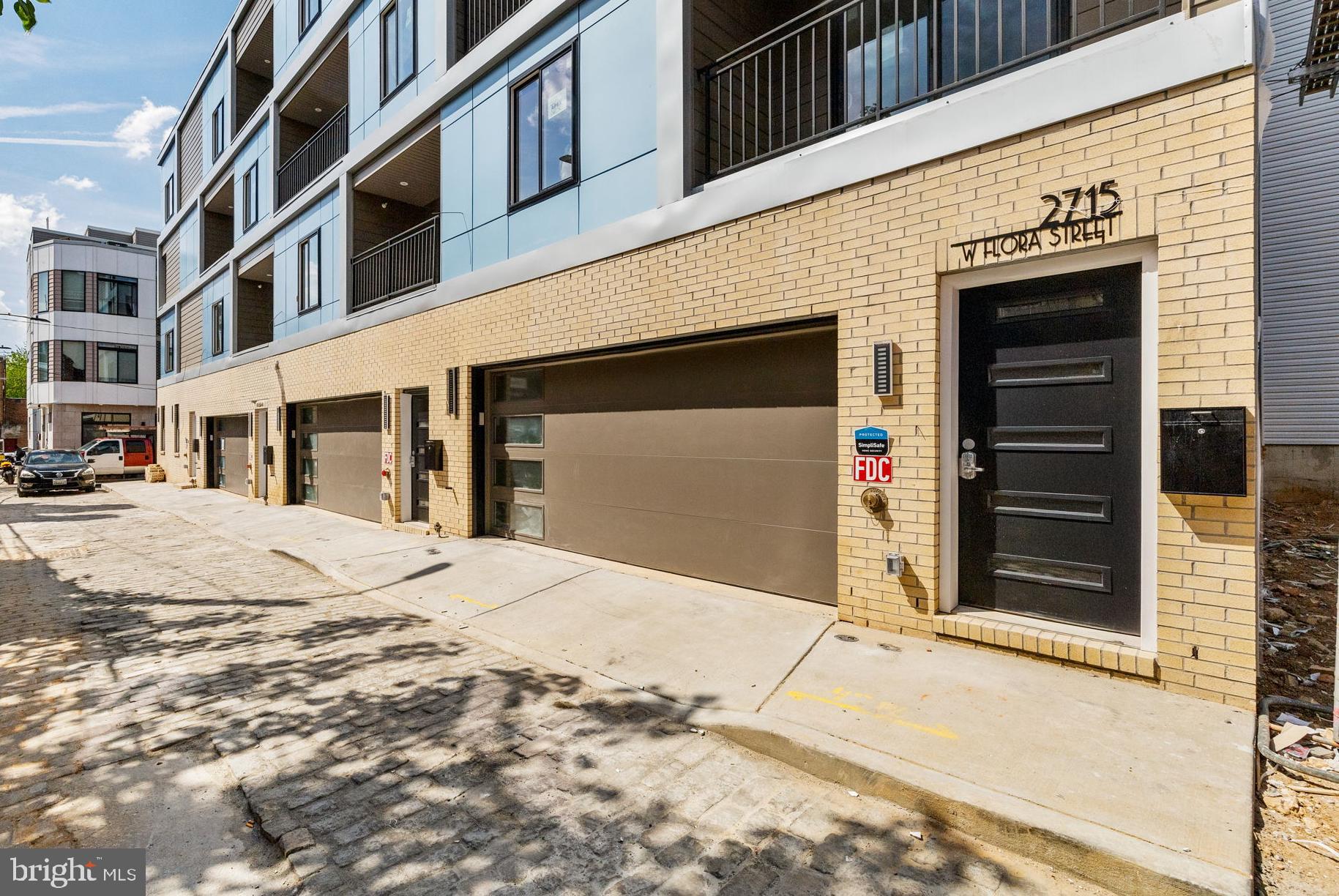 Introducing 2717 W. Flora Street! This luxury, new construction home impresses immediately with two-car garage, elevated finishes, and unparalleled views of Center City Philadelphia. On the entry level, 9 foot ceilings dominate the oversized two-car garage, storage closet, and interior foyer. Don’t miss the electric vehicle charging station!
On the main level, oversized windows and the first of three outdoor spaces greet you. The southern exposure of this home immerses the residence with year-round natural light. The floating stairwell with glass partition brings light into the hallway and elevates the entire lived experience. Hardwood floors throughout living areas. Upgraded kitchen with shaker white or gray cabinets, calcutta quartz countertop, and Cerrad porcelain white tile backsplash. Oversized living and dining area. Tiled powder room on the main level for convenience.
The second floor is dominated by the primary bedroom suite, and you'll love the laundry at the top of the stair for convenience. Ample room for a king-sized bed, big walk-in closet as well as a secondary closet, and a decadent primary bathroom with water closet, double vanity, walk-in shower, and soaking tub. Even better, there’s a private, second balcony in the bedroom as well!
Three additional bedrooms on the third floor. Each room could serve a myriad of uses: guest or household bedroom, nursery, home office, or even home gym. Full bathroom with double vanity and shower/tub.
Incredible Center City views from the 23-foot wide roof deck. It’s great in the daytime and even better at night. A short walk to Fairmount Park, Athletic Square, and around the corner from The Boozy Mutt and Crime & Punishment Brewing Company.
Ten year tax abatement. Quiet street. Be confident of completion in April 2025. Visit an open house this weekend or schedule your private showing today!